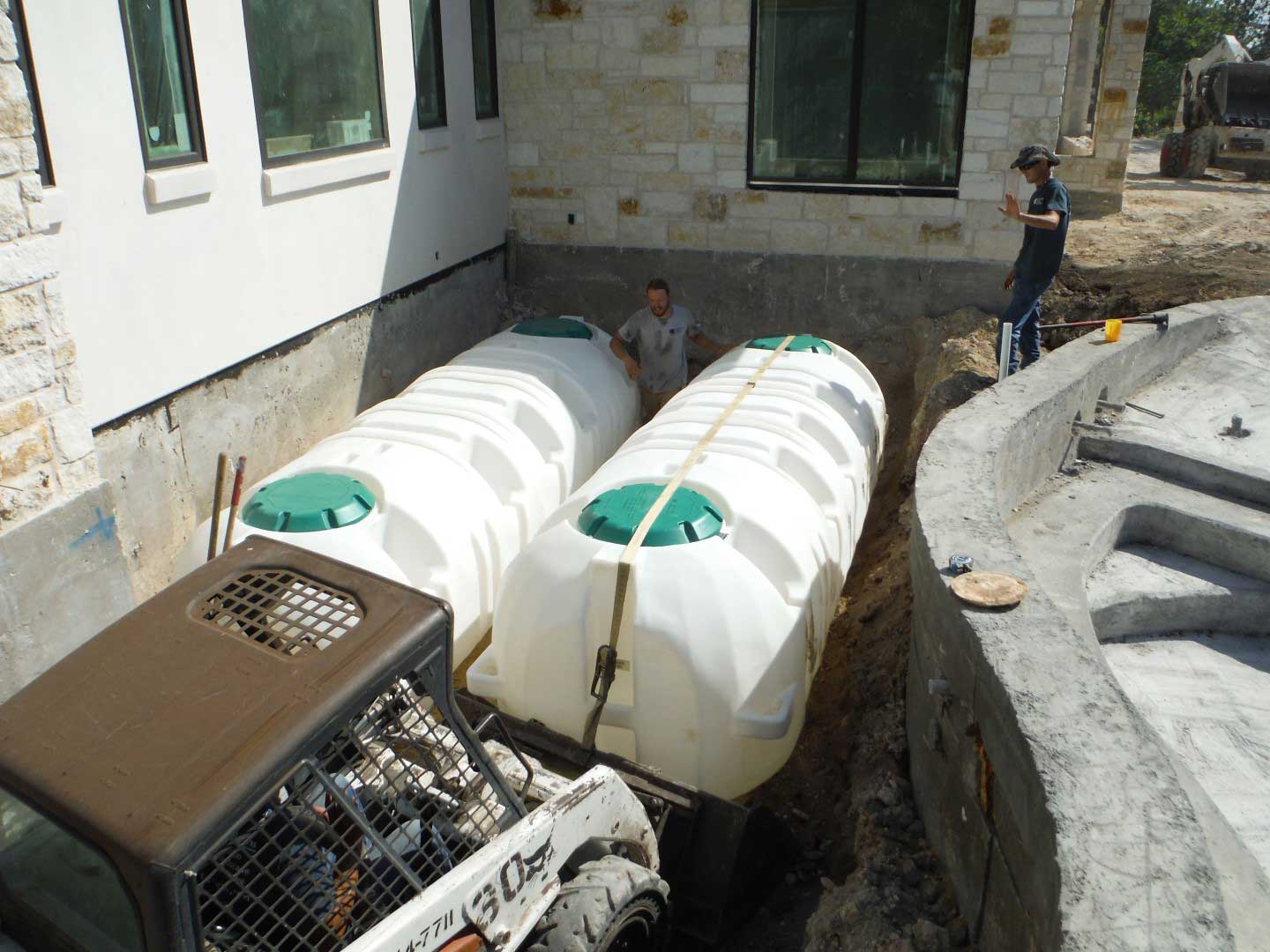 underground poly tanks by pool