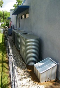 group of three metal slimline tanks