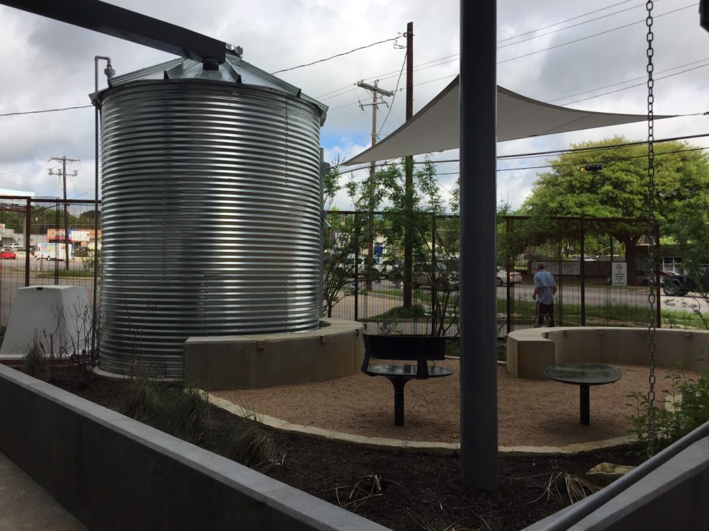 rainwater collection system in bluebonnet studios courtyard