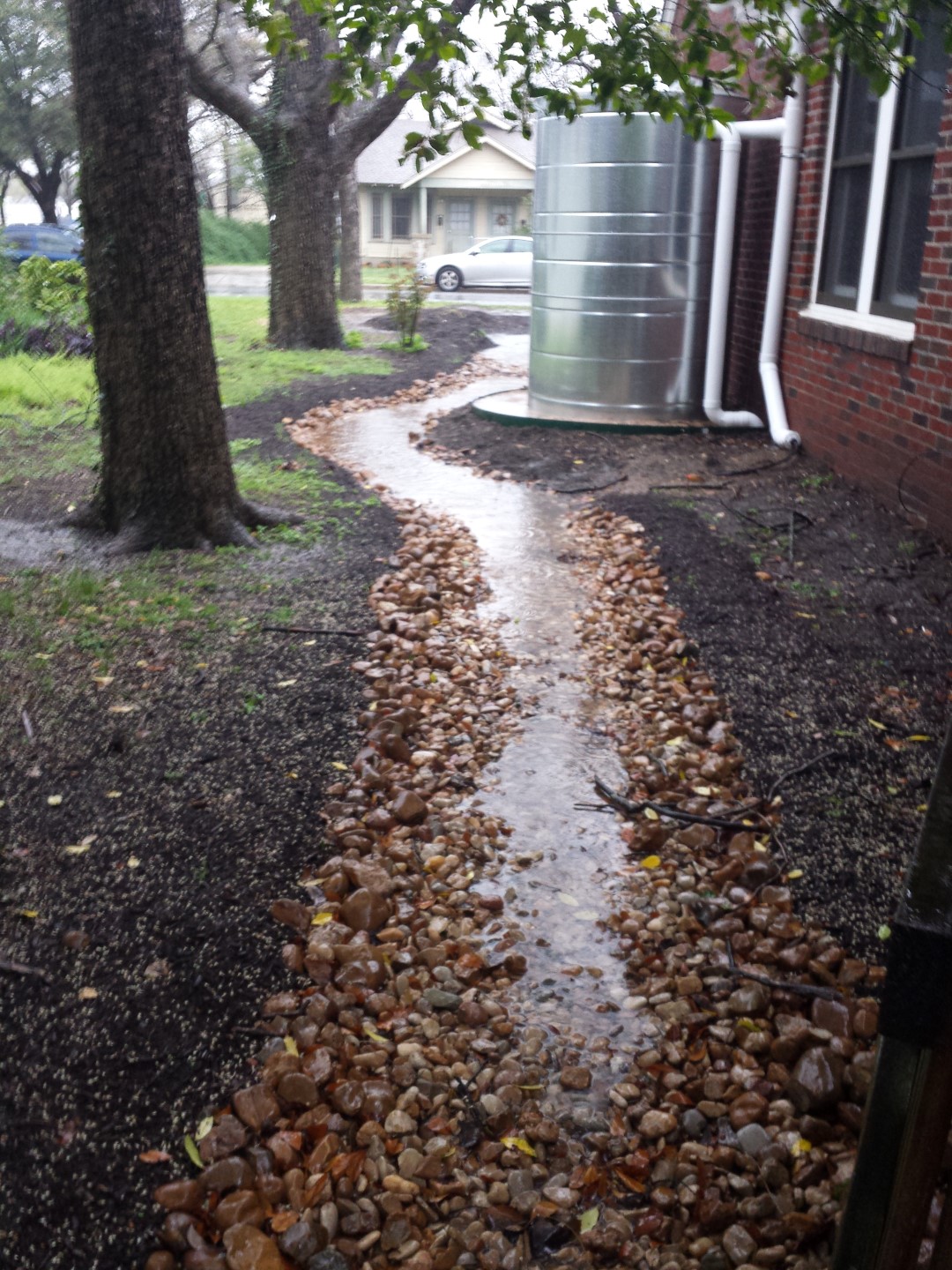 drainage swale with river rock